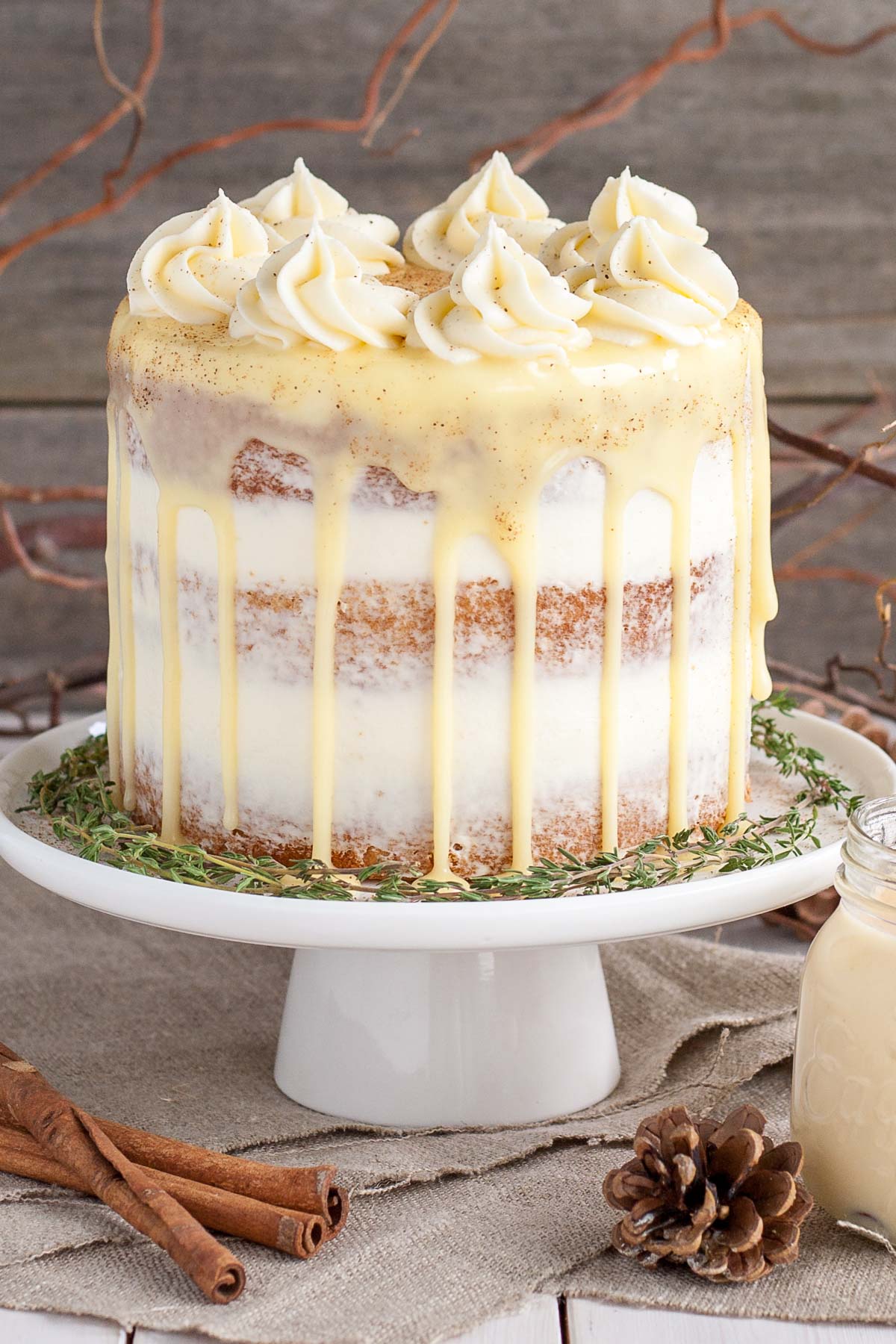 This Eggnog Cake with cream cheese frosting and white chocolate ganache is just the thing to warm you up this Holiday season! | livforcake.com Eggnog cake with cream cheese frosting and white chocolate ganache.