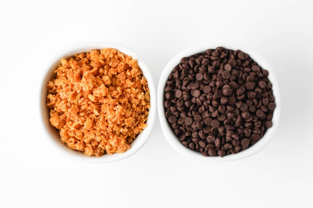 Overhead shot of chocolate chips and cereal in a bowl.