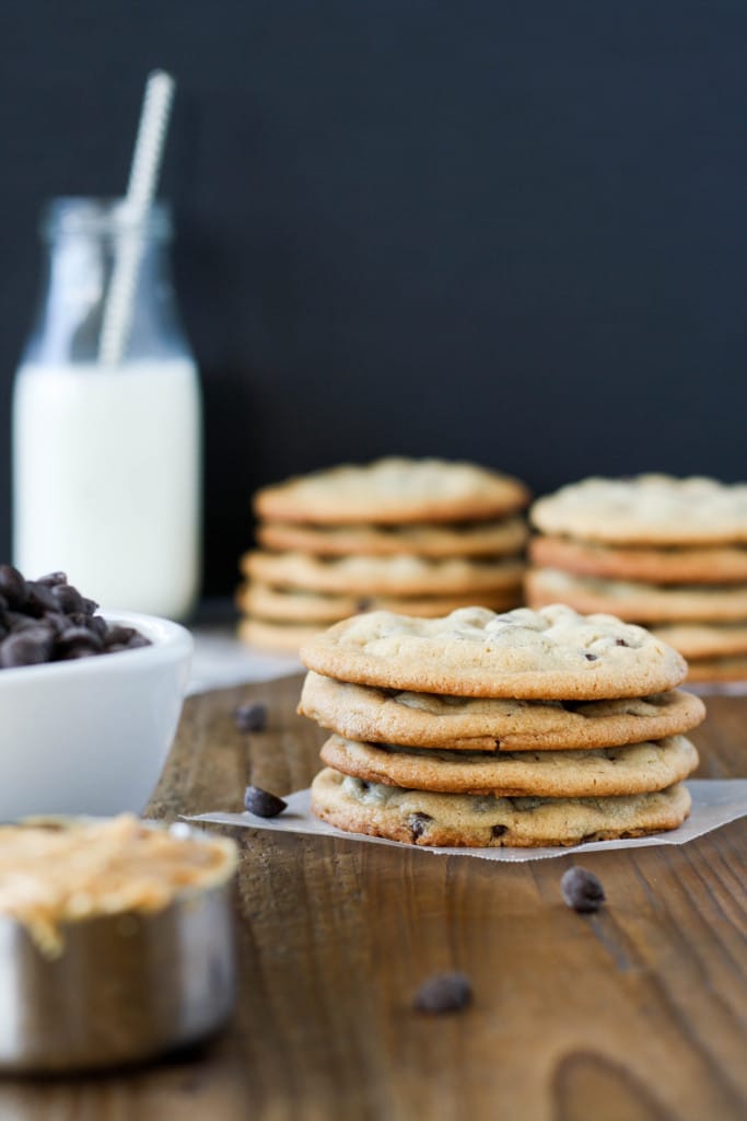 Peanut Butter Chocolate Chip Cookies! These chewy cookies are sweet, salty, and delicious. | livforcake.com A stack of chewy peanut butter chocolate chip cookies