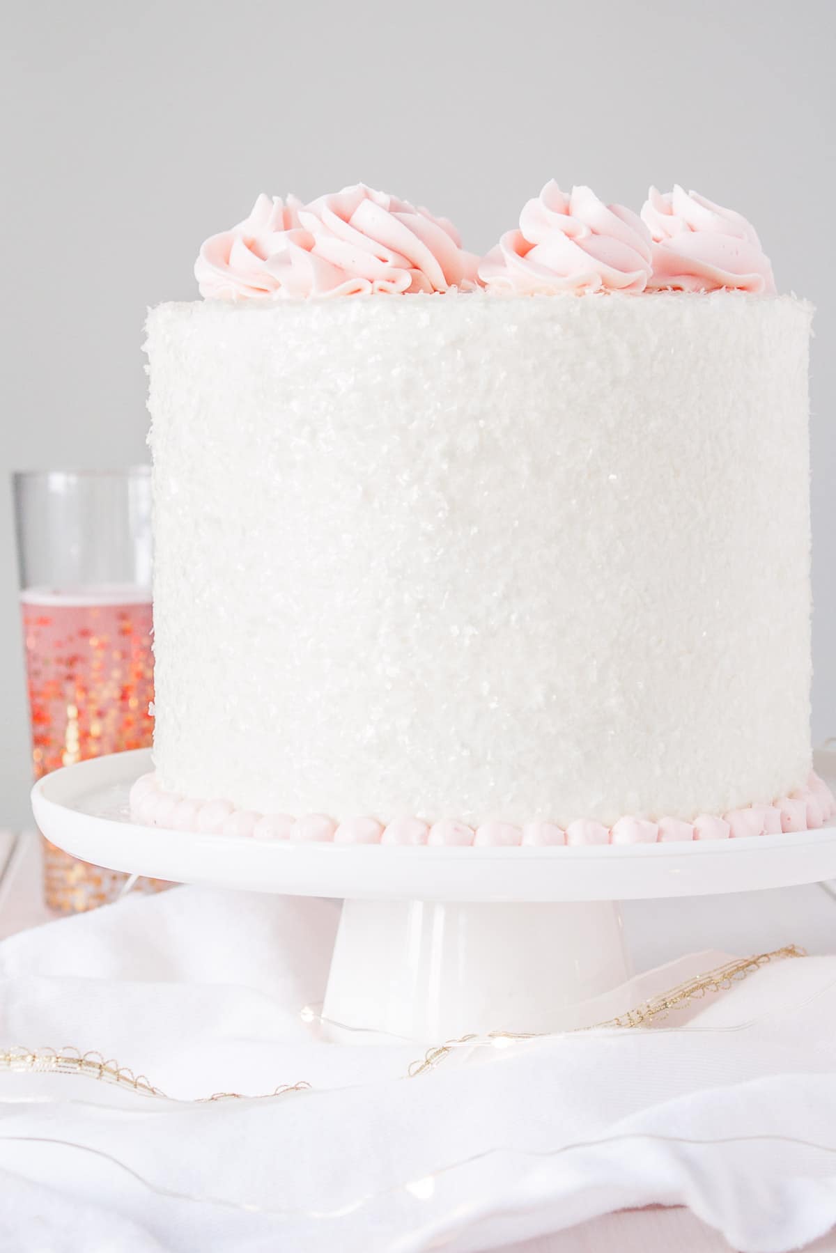 This Pink Champagne Cake is the perfect way to celebrate any occasion or holiday! A champagne infused cake with a classic vanilla buttercream. | livforcake.com This Pink Champagne Cake is the perfect way to celebrate any occasion or holiday!