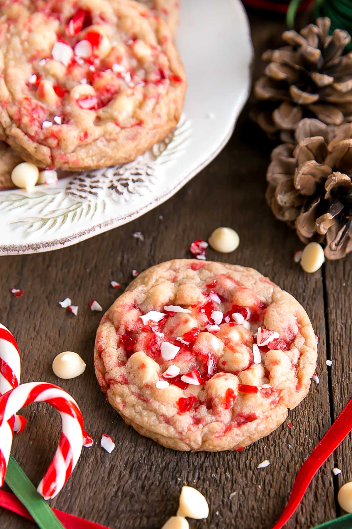These White Chocolate Candy Cane Cookies are crispy, chewy and delicious. The perfect sweet treat for the holidays! | livforcake.com Chewy White Chocolate Candy Cane Cookies